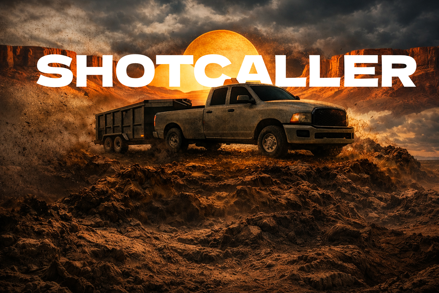 Truck and trailer in rugged desert landscape
